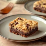 A plate of brookies and blondies side by side showing the contrast in texture and color.